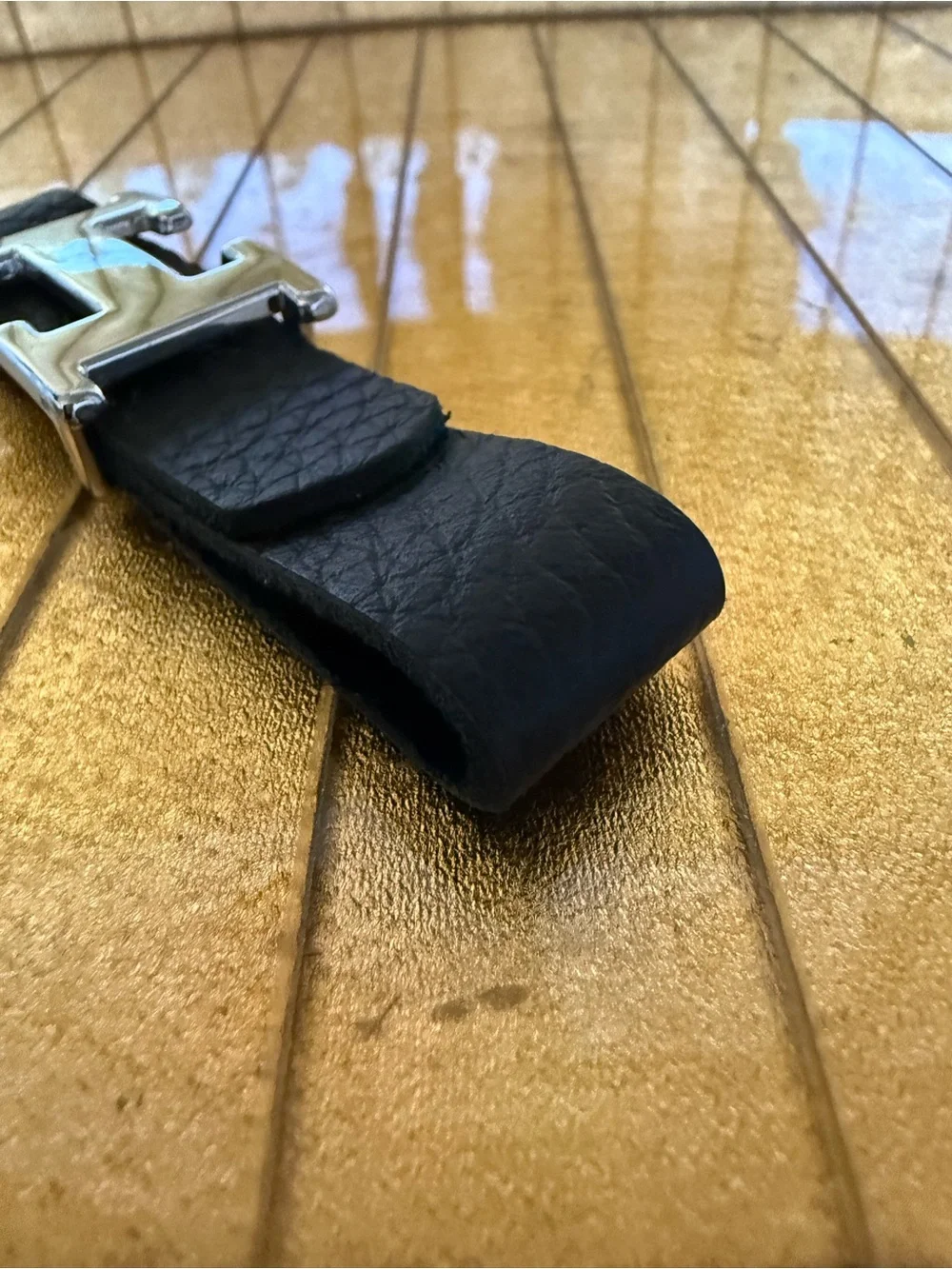 “H” chrome and black leather keychain